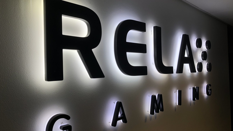 relax gaming logo on wall